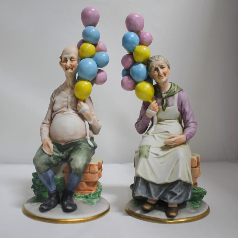 Lot of 2 Capodimonte Figurines: Old Man with Balloons & Old Woman with Balloons