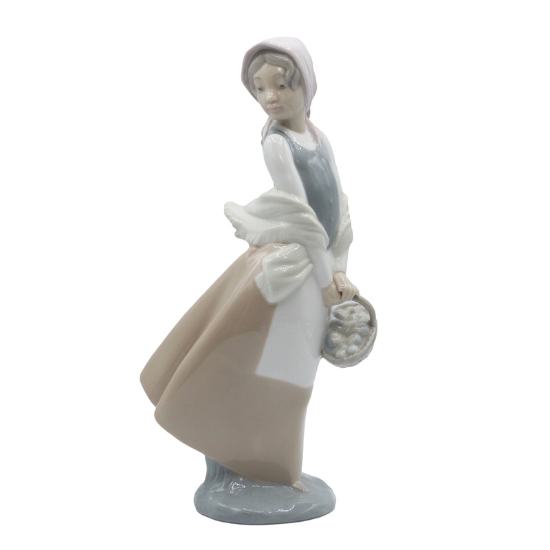 Nao by Lladr Figurine: 4834 Windswept Girl with Basket